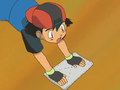 Ash wearing his second hat backwards