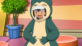 Ash dressed up as a Snorlax in the Gourgeist Festival.