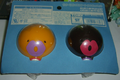 A promotional toy version of Annie and Oakley's Poké Balls, produced by Tomy