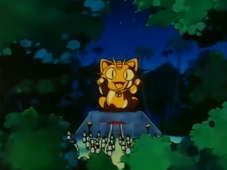 Golden Island Meowth statue.png