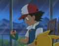 Ash holding the "whole" broken Poké Ball