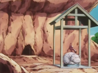 Slowpoke Well exterior anime.png