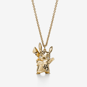 Tiffany & Arsham Studio & Pokémon Pikachu Gold standing.png