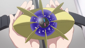 Nebby as a Cosmoem in Lillie's hands in Pokémon Evolutions