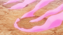 Laquium mist being emitted from the footprints of a Pokémon under its effects