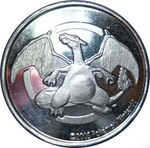 WC05 Metal Charizard Coin.jpg