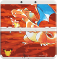 A white New Nintendo 3DS with cover plates featuring Charizard.
