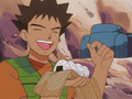 Brock emphasizing that the rice balls are, in fact, donuts