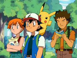 Why does Trip have a different badge holder than the one that Ash